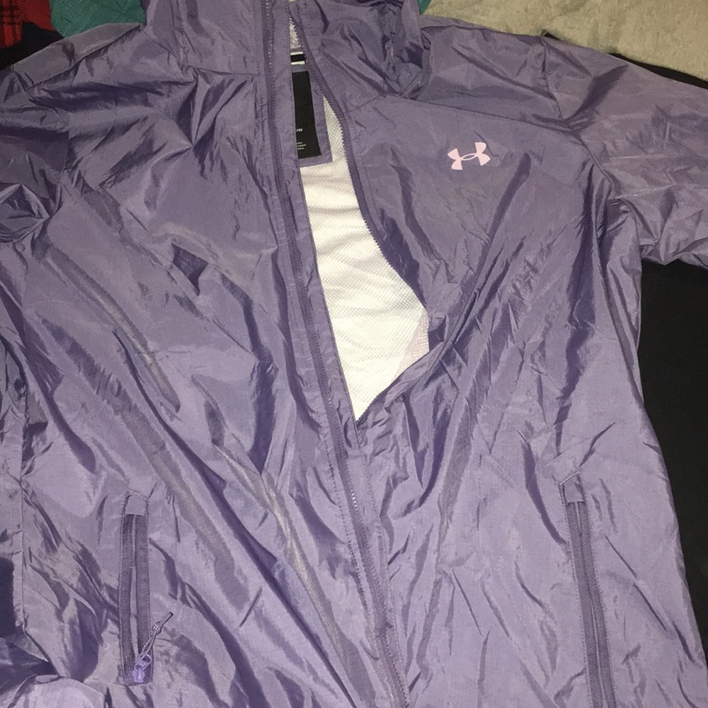 Under armor wind breaker, size large, purple with light pink/purple logo